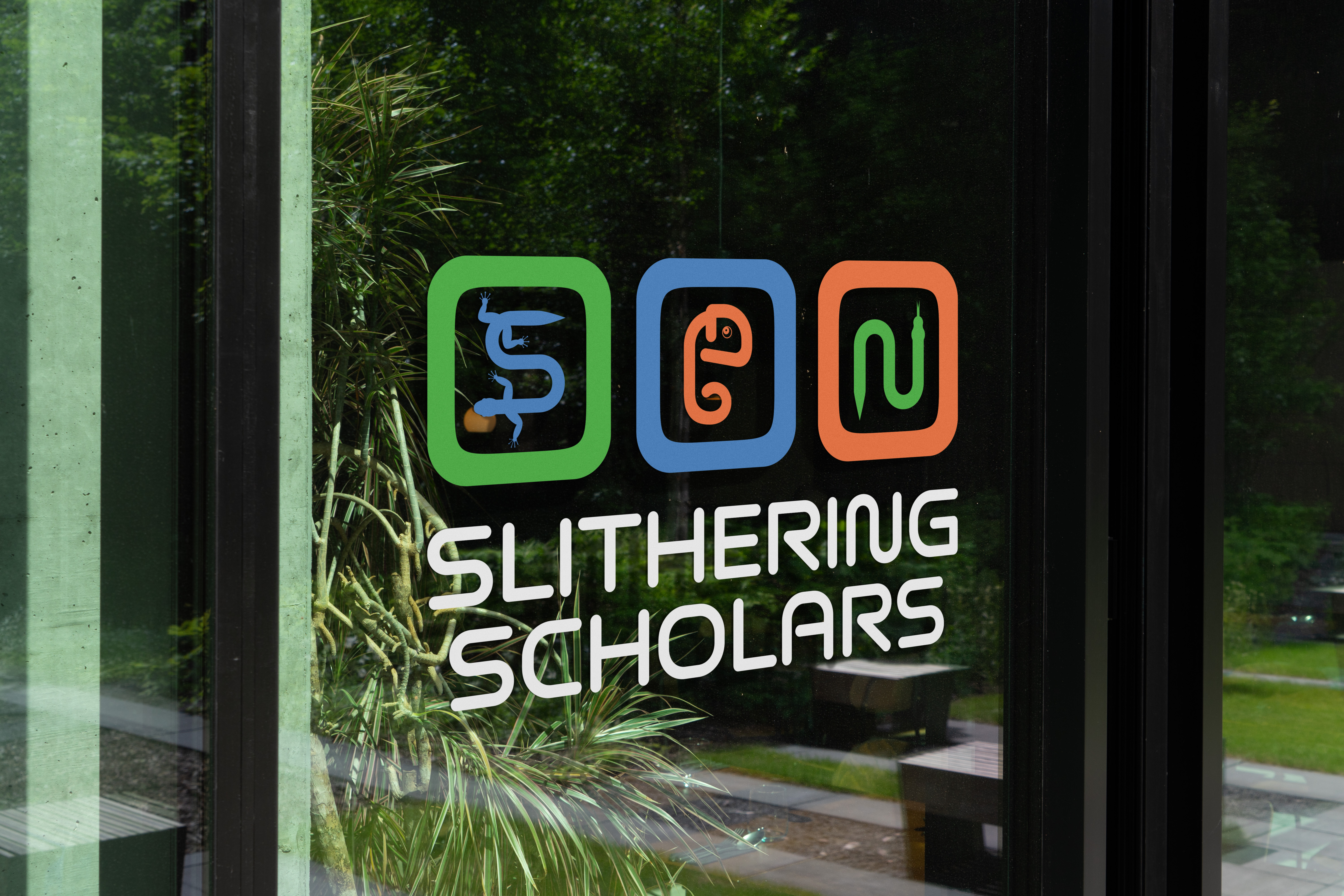 window decal of the Slithering Scholars logo